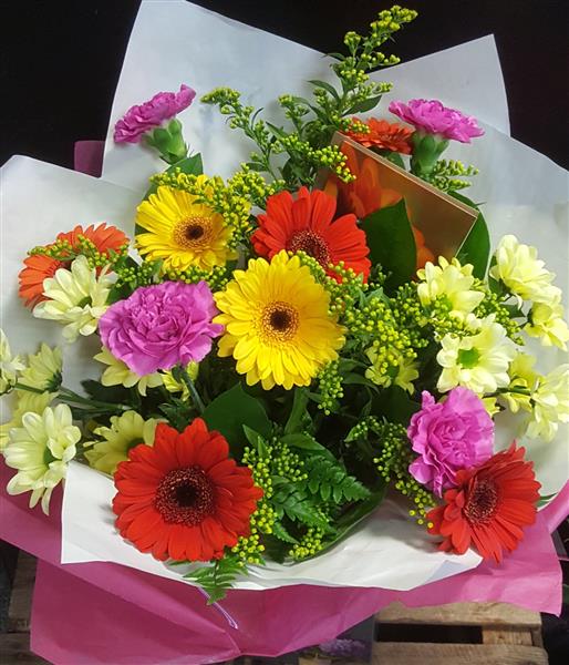 Margaret Raymond Florist Happy Flowers with bright pink, red, orange and yellow