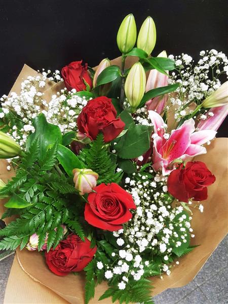 Margaret Raymond Florist Pink Lillies and Red Roses with Gyp